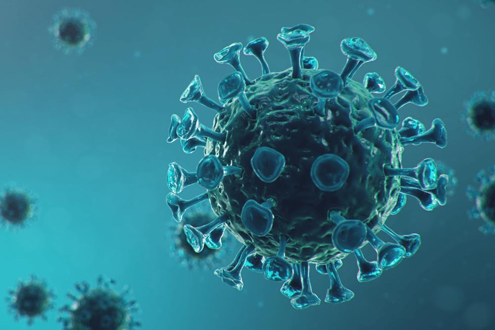 coronavirusdeeltje in petrolblauw tegen lichter blauwe achtergrond met meer virusdeeltjes klein in de achtergrond